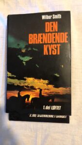 Den Brændende Kyst del 1 & 2(Wilbur Smith) Hardback